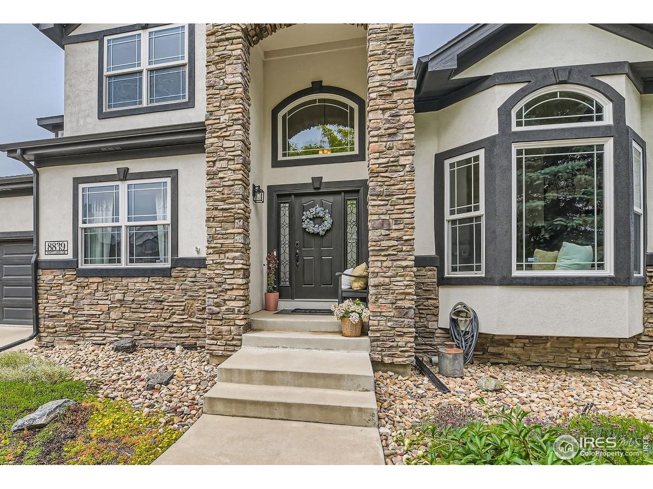 8839 Shetland Drive Frederick, CO 80504 - Photo 3 of 40 a front view of a house