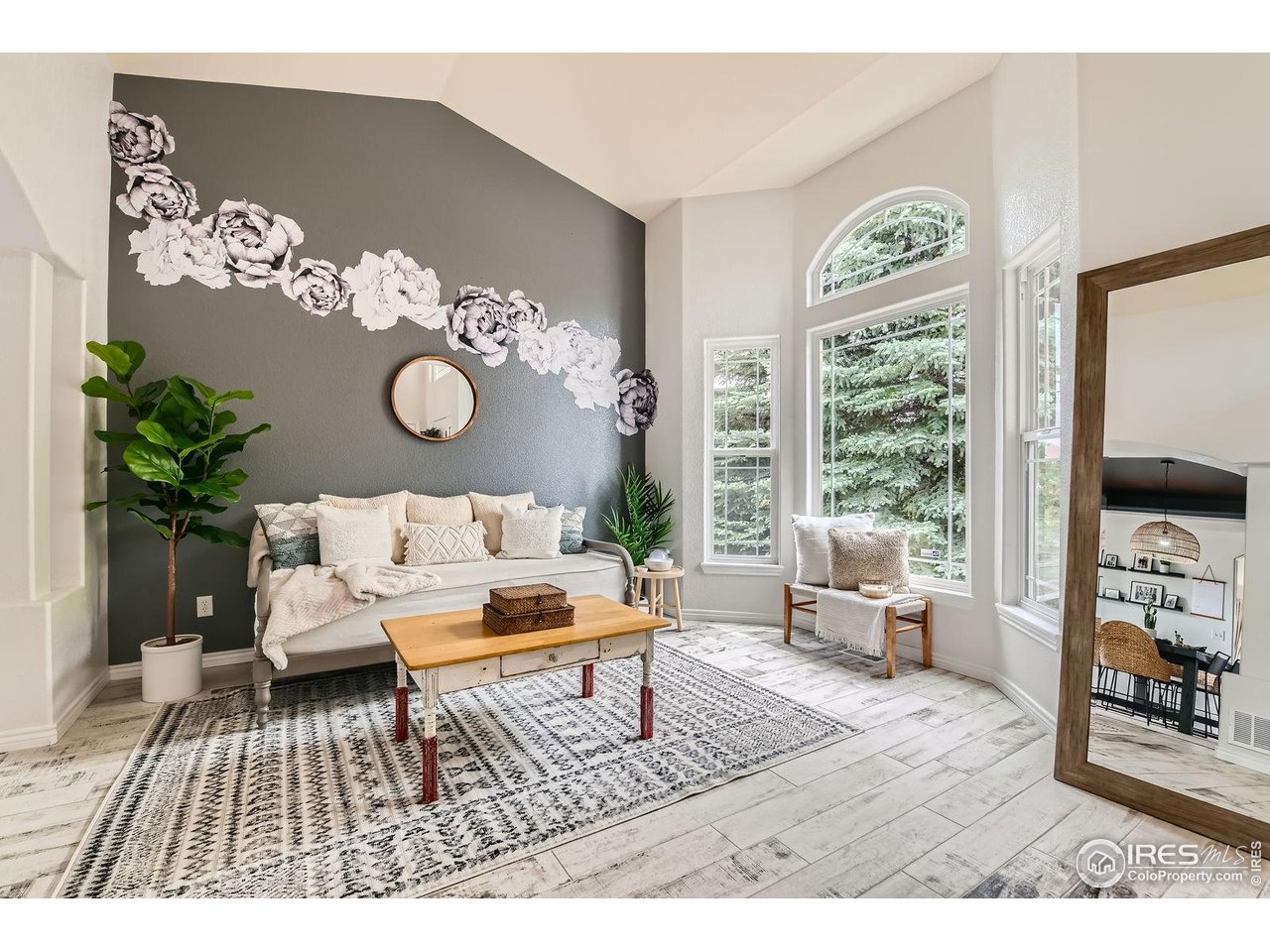 8839 Shetland Drive Frederick, CO 80504 - Photo 5 of 40 a living room with furniture and a large window