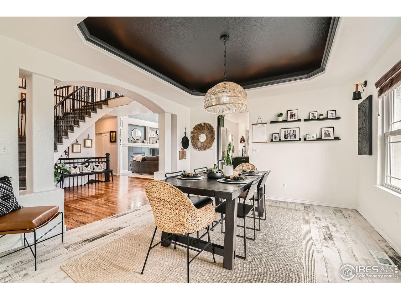 8839 Shetland Drive Frederick, CO 80504 - Photo 8 of 40 a view of a livingroom and dining room