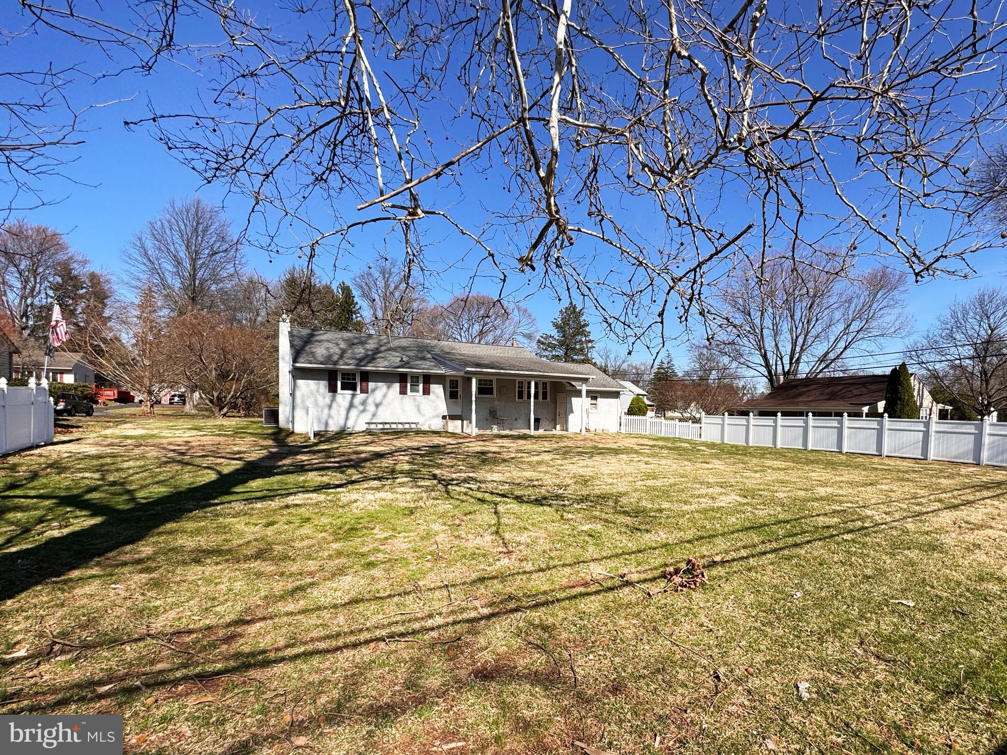 1228 Clyde Road Warminster, PA 18974 - Photo 15 of 19 a view of a yard with a house in the background