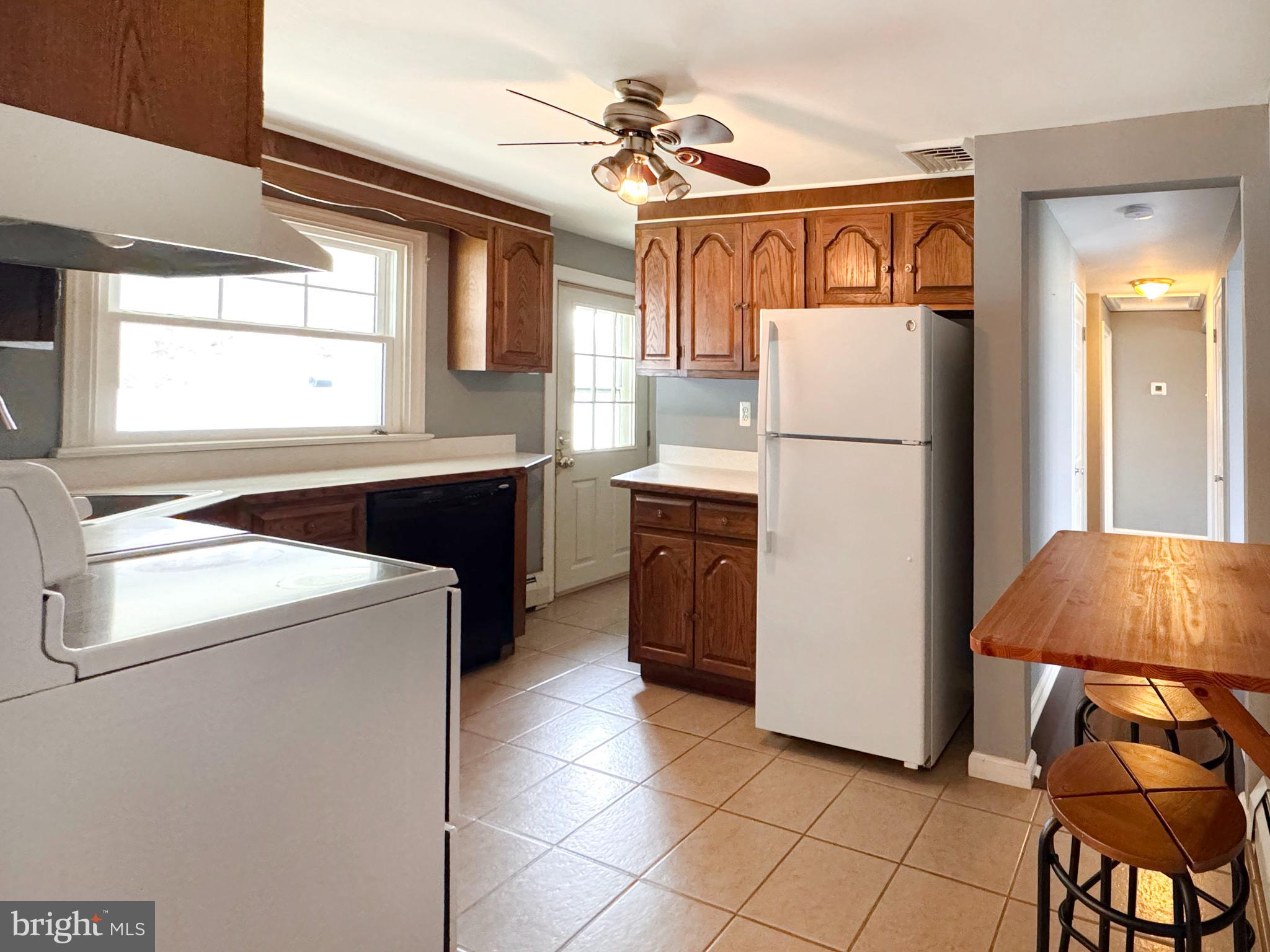 1228 Clyde Road Warminster, PA 18974 - Photo 6 of 19 a utility room with dryer and washer
