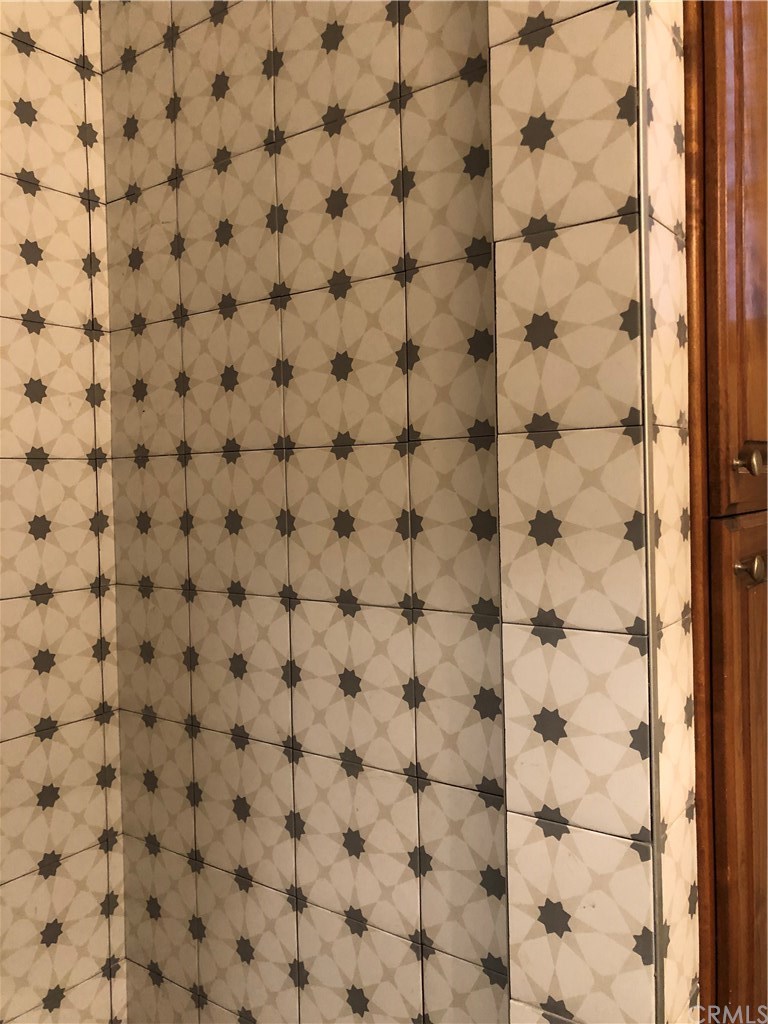 2455 Elden Avenue Costa Mesa, CA 92627 - Photo 12 of 13 Beautiful tile in the downstairs shower