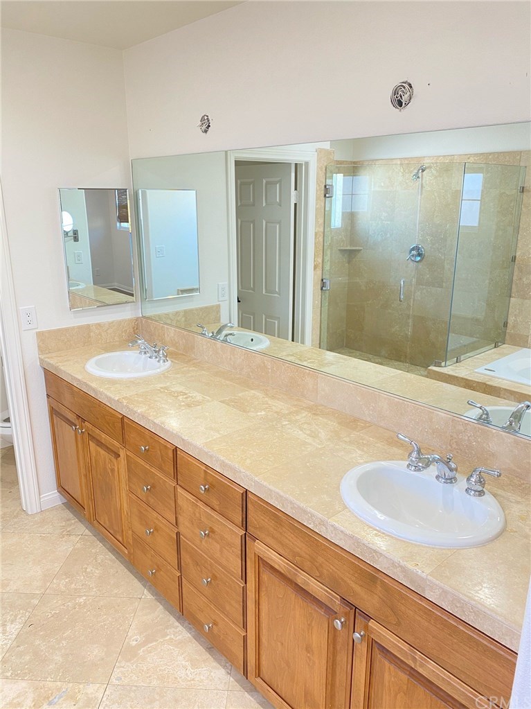 2455 Elden Avenue Costa Mesa, CA 92627 - Photo 6 of 13 Dual sinks in the master bedroom