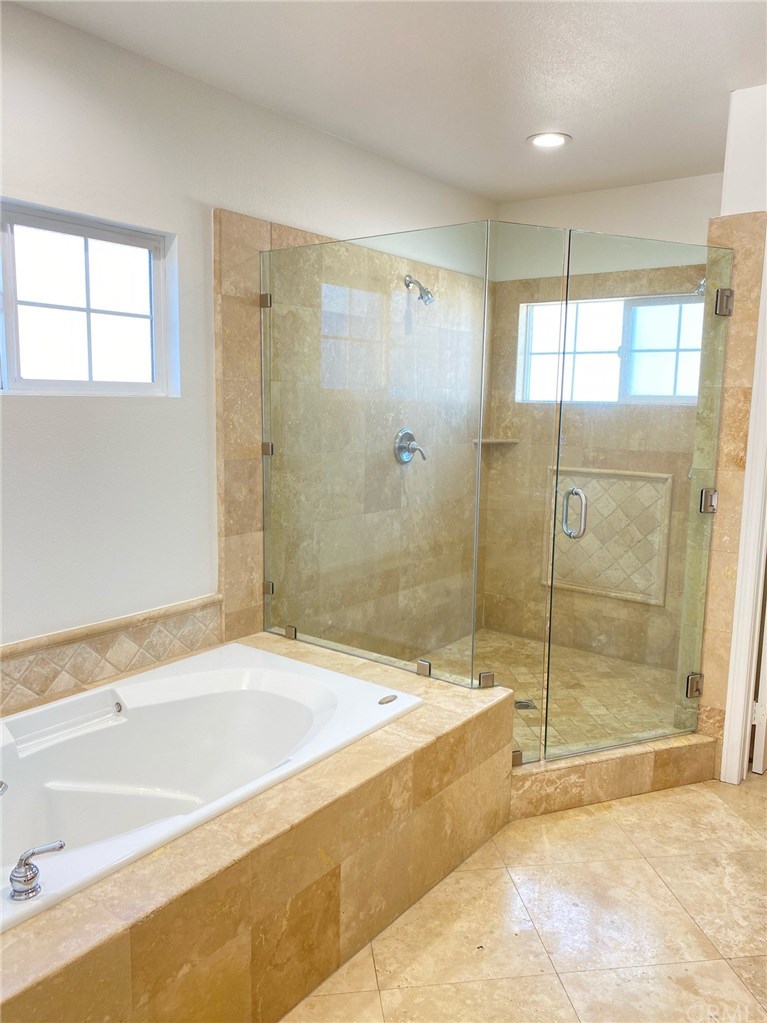2455 Elden Avenue Costa Mesa, CA 92627 - Photo 7 of 13 relaxing soaking tub in the master bathroom