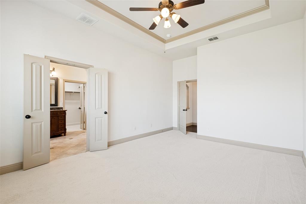511 Mimosa Trail Forney, TX 75126 - Photo 16 of 30 Split bedrooms offer privacy as well as new carpet.