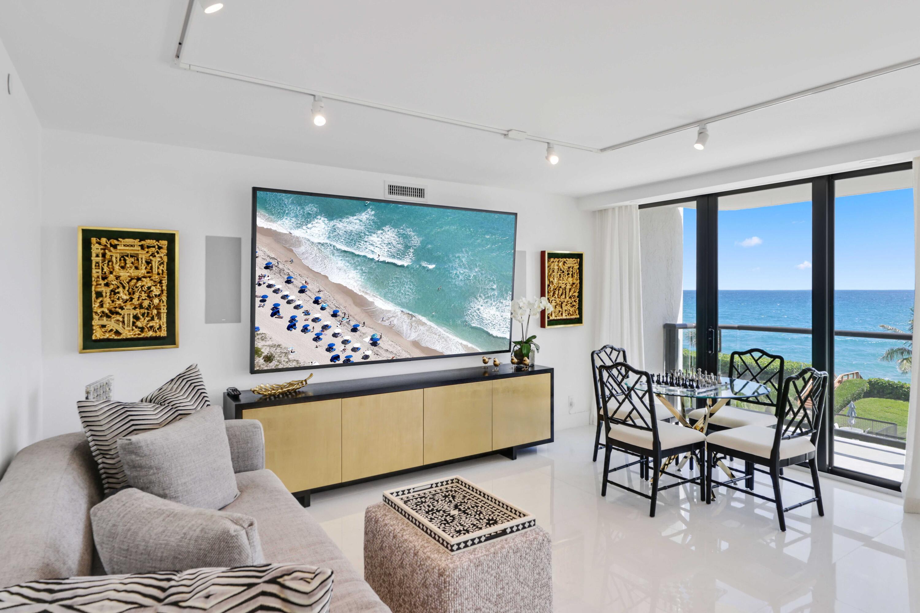 3440 South Ocean Boulevard, Unit 402S Palm Beach, FL 33480 - Photo 18 of 33 a living room with furniture and a large window