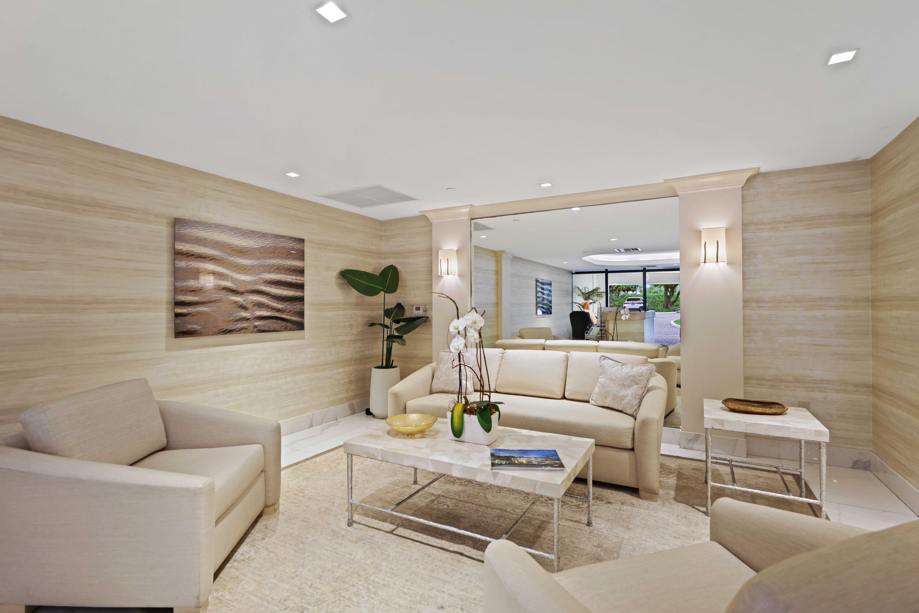 3440 South Ocean Boulevard, Unit 402S Palm Beach, FL 33480 - Photo 26 of 33 a living room with furniture and a couch