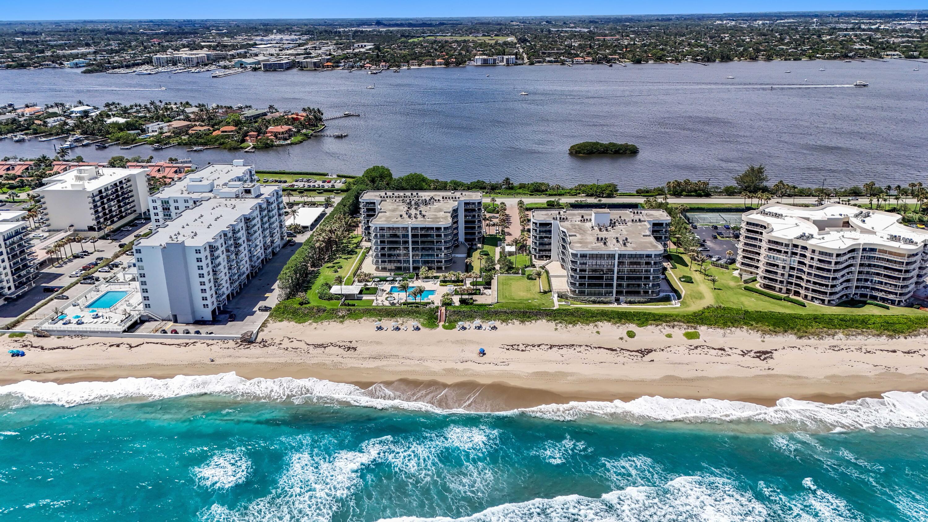 3440 South Ocean Boulevard, Unit 402S Palm Beach, FL 33480 - Photo 31 of 33 an aerial view of a house with a yard and outdoor seating