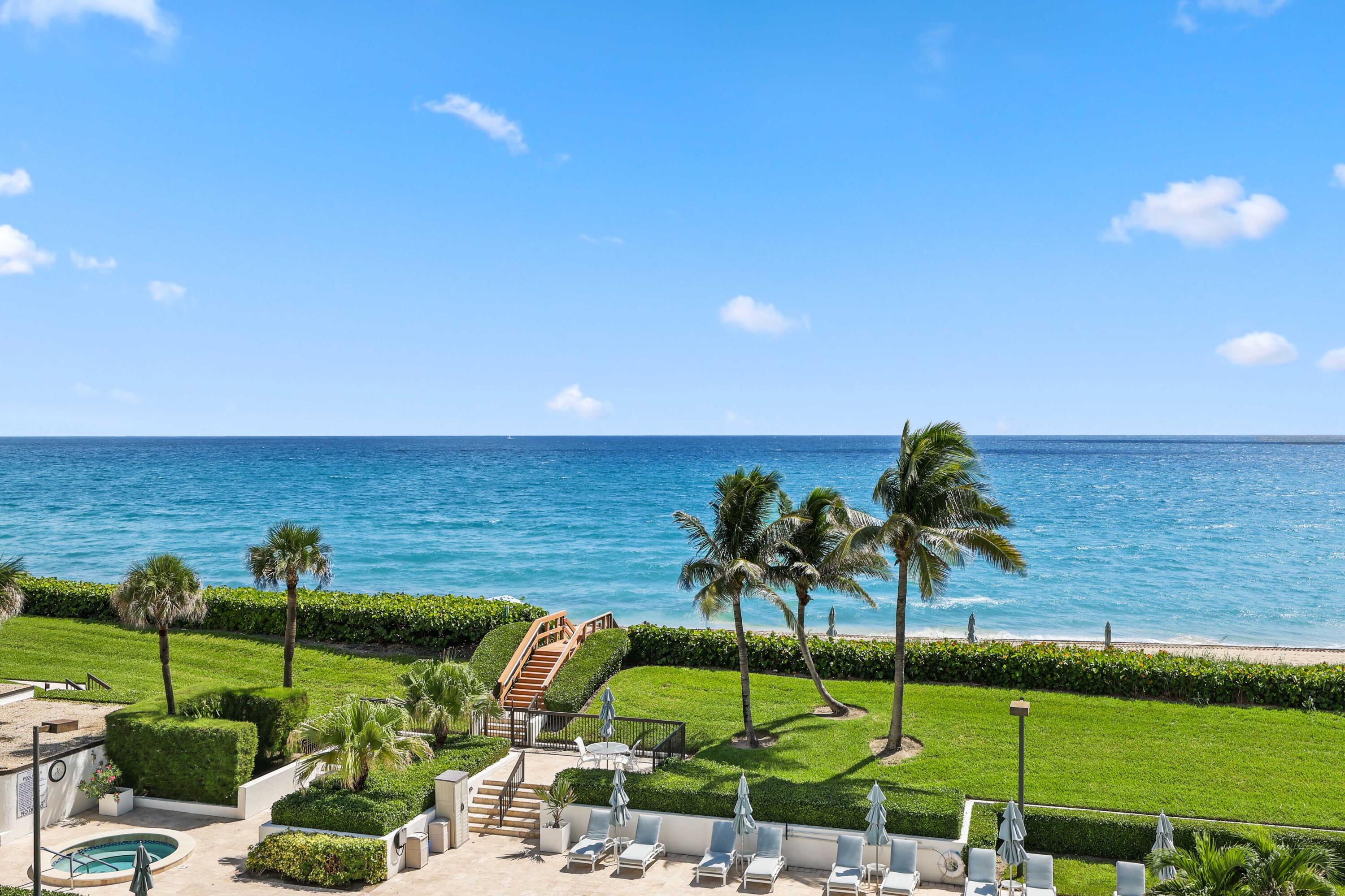 3440 South Ocean Boulevard, Unit 402S Palm Beach, FL 33480 - Photo 6 of 33 a view of a lake with a palm tree