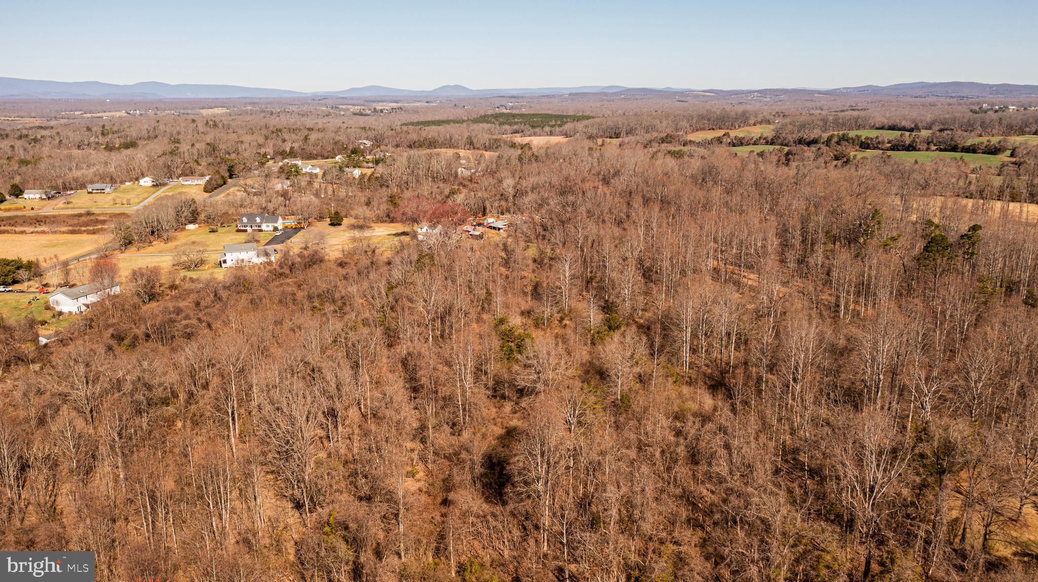 8158 Botha Road Warrenton, VA 20186 - Photo 1 of 30 an aerial view of residential houses with outdoor space and mountain view