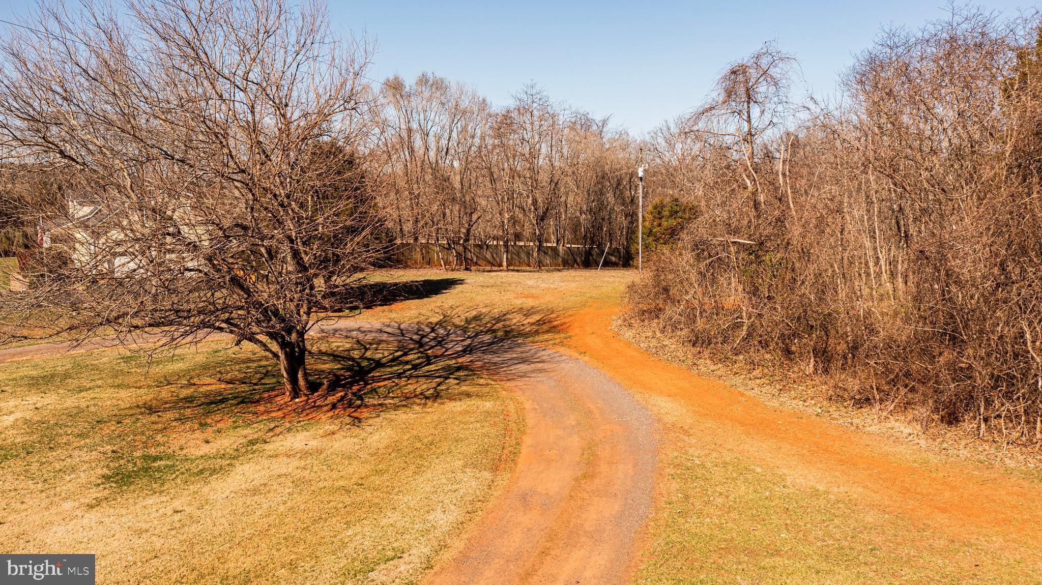 8158 Botha Road Warrenton, VA 20186 - Photo 27 of 30 a view of a yard covered in snow
