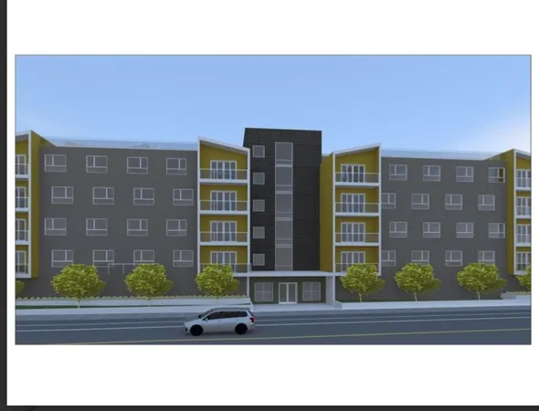 a picture of a bench in front of a building