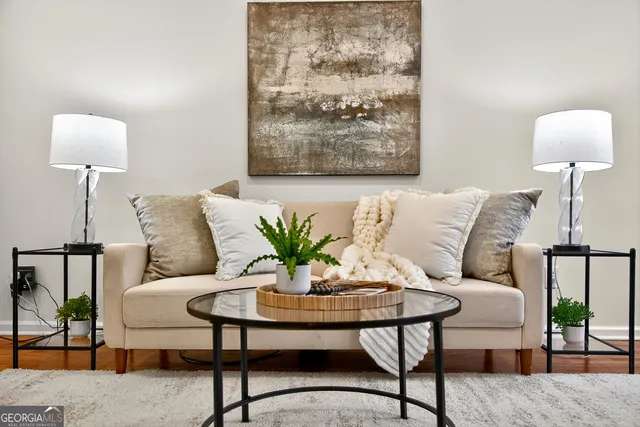 a kitchen with stainless steel appliances granite countertop a refrigerator sink and stove