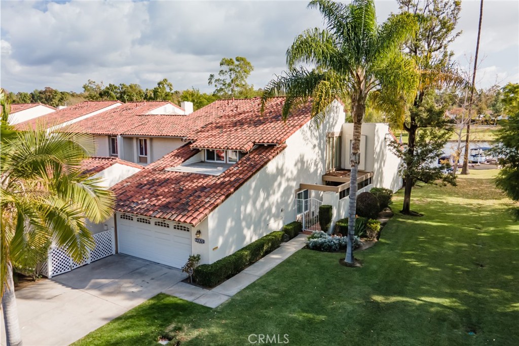 22058 Arrowhead Lane Lake Forest, CA 92630 - Photo 2 of 62 a view of a house with a yard