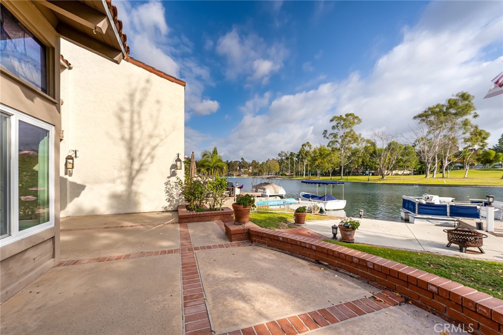 22058 Arrowhead Lane Lake Forest, CA 92630 - Photo 35 of 62 a view of swimming pool with outdoor seating and lake view
