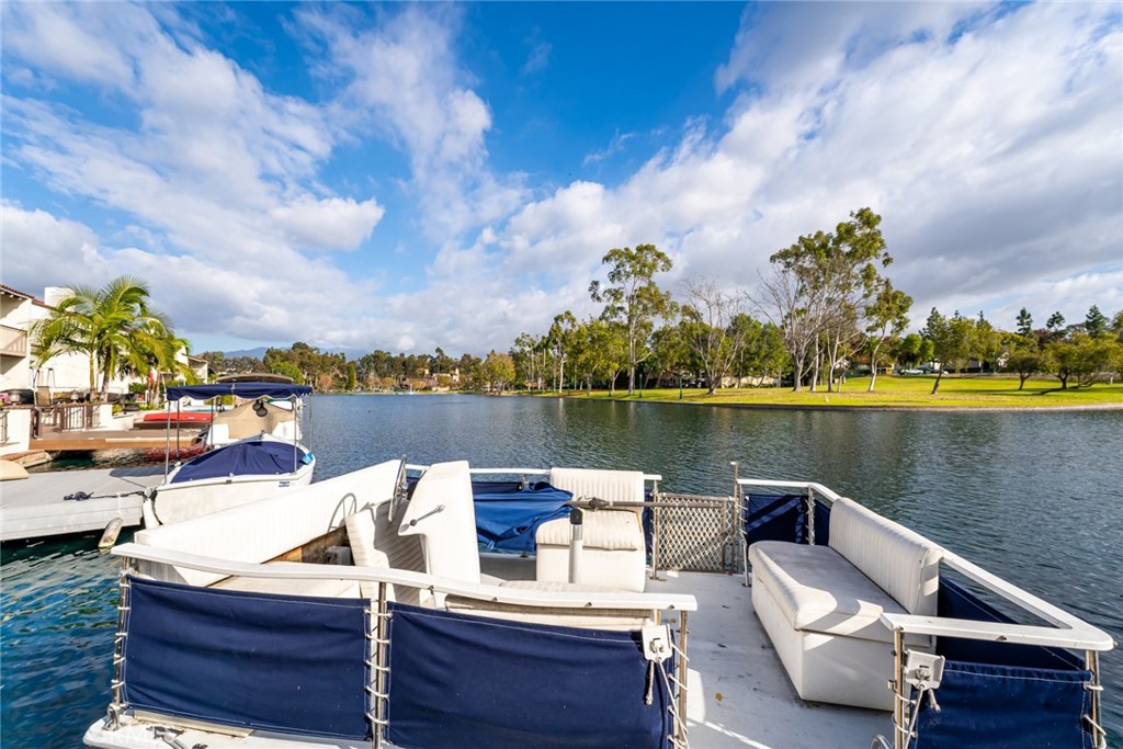 22058 Arrowhead Lane Lake Forest, CA 92630 - Photo 37 of 62 a view of a lake with couches chairs