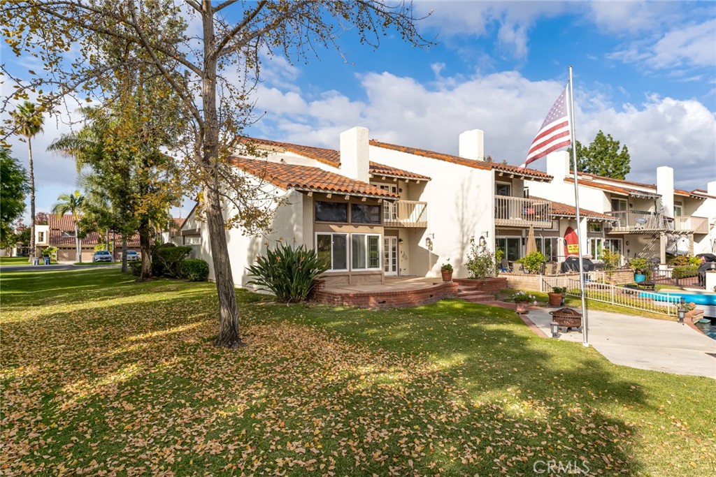 22058 Arrowhead Lane Lake Forest, CA 92630 - Photo 38 of 62 a view of a house with a yard