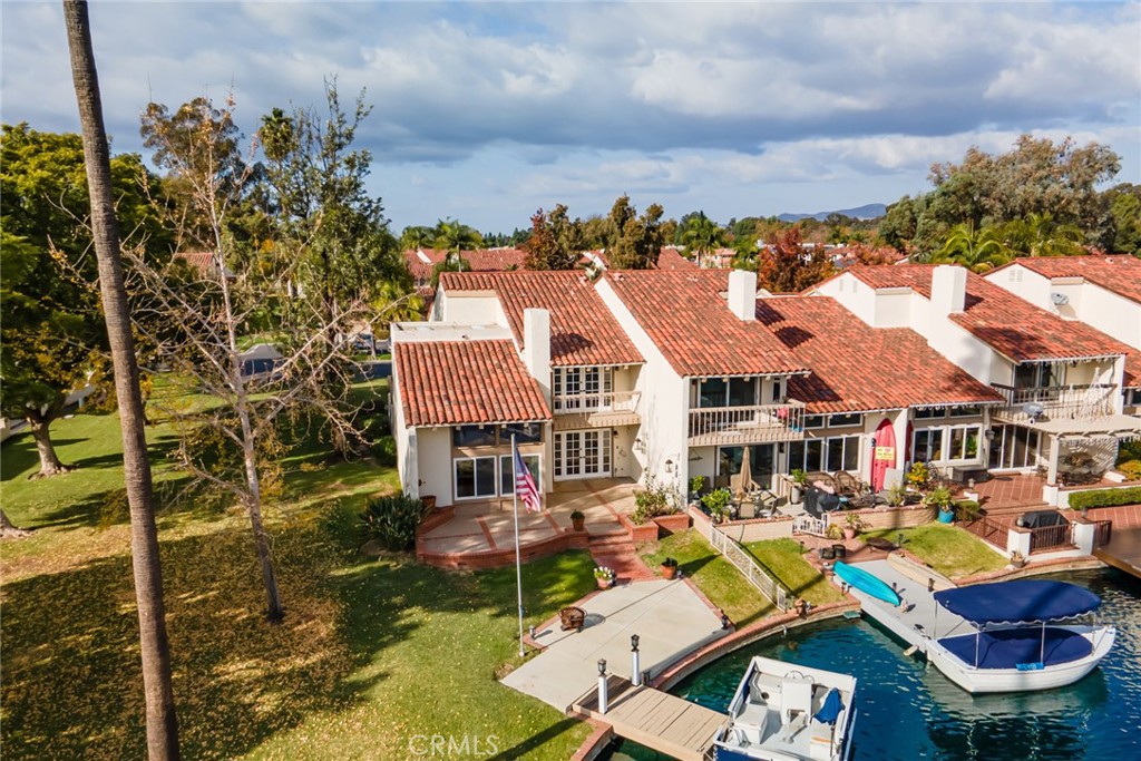 22058 Arrowhead Lane Lake Forest, CA 92630 - Photo 42 of 62 a aerial view of a residential apartment building with a yard