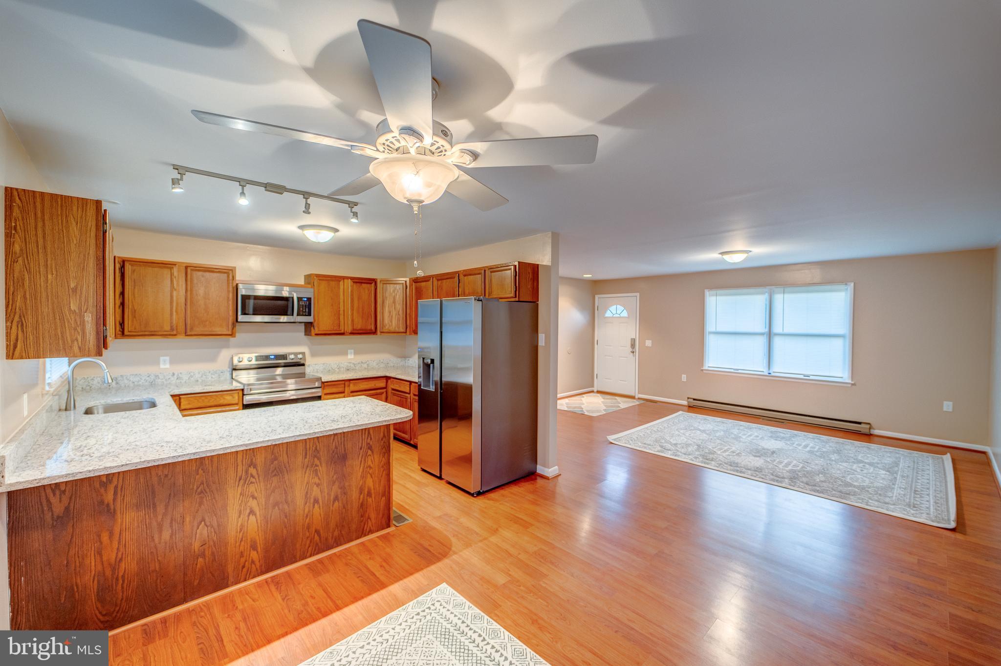 205 Newtown Road Chester, MD 21619 - Photo 35 of 53 Kitchen w/New granite counter tops, open livingrm