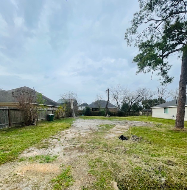4817 Paula Street Houston, TX 77033 - Photo 4 of 7 a view of a backyard