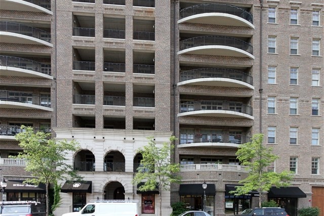 151 West Wing Street, Unit 610 Arlington Heights, IL 60005 - Photo 1 of 21 a front view of a multi story building