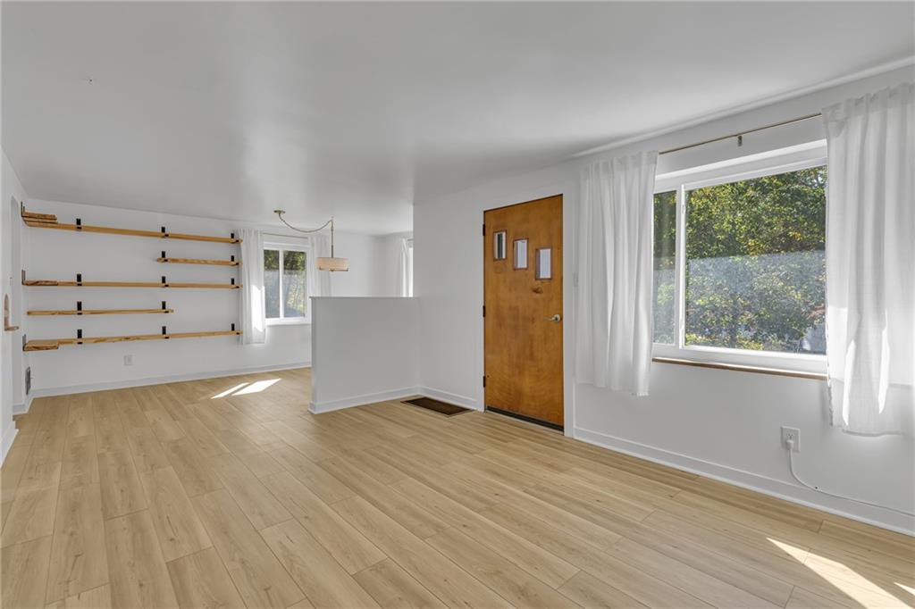 584 Chapel Road Aliquippa, PA 15001 - Photo 13 of 30 Living Room has direct access to the front of the house.