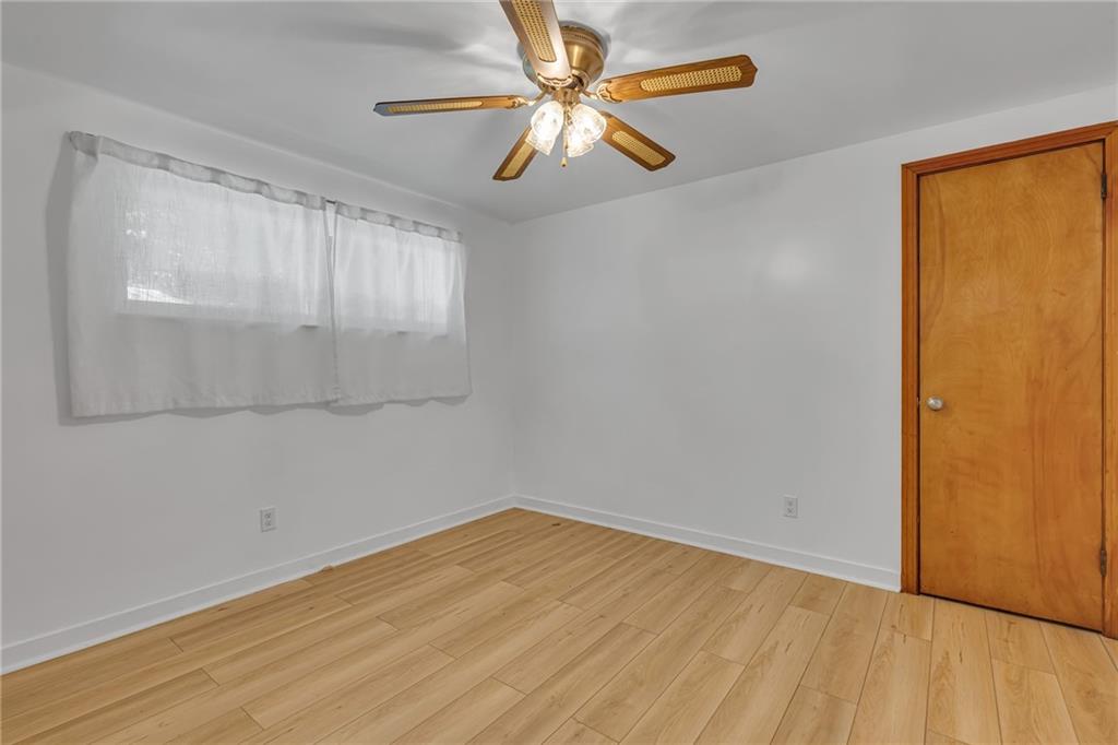 584 Chapel Road Aliquippa, PA 15001 - Photo 21 of 30 BR #3. This view includes one of the two closets featured in the third bedroom.