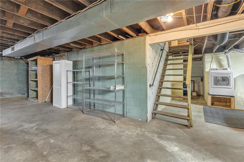 584 Chapel Road Aliquippa, PA 15001 - Photo 23 of 30 Very large basement, with direct access to the kitchen (stairs) and garage/exterior.