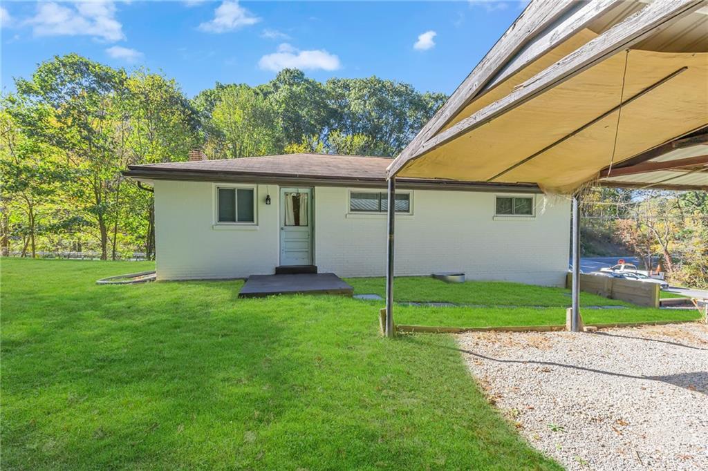 584 Chapel Road Aliquippa, PA 15001 - Photo 24 of 30 Three options to enter the house, this being the "back" door into the kitchen.