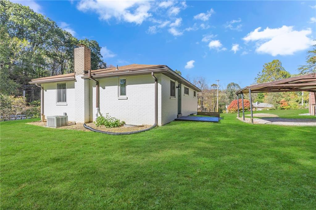 584 Chapel Road Aliquippa, PA 15001 - Photo 25 of 30 Covered parking is directly off of the kitchen door. Makes for easy access when carrying in the groceries.
