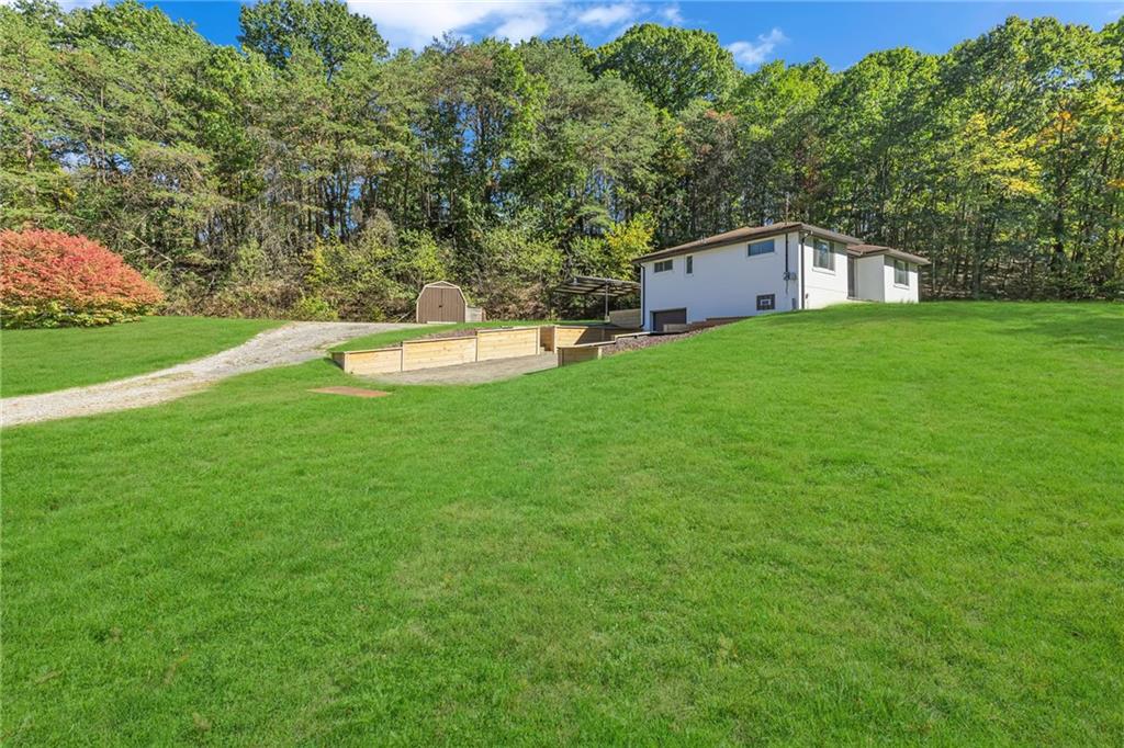 584 Chapel Road Aliquippa, PA 15001 - Photo 3 of 30 Surrounded by trees with plenty of parking and privacy!