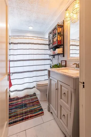 a bathroom with a sink and a washing machine