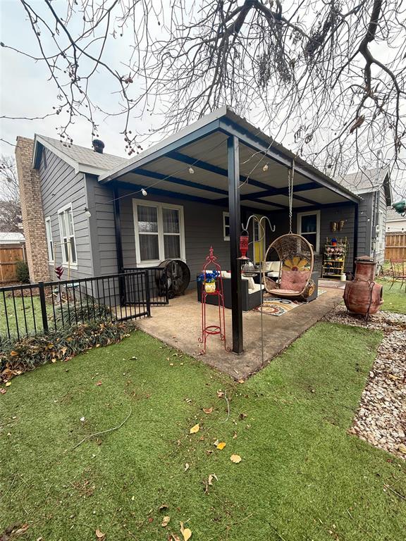 1208 Carolina Street Graham, TX 76450 - Photo 20 of 25 a view of a house with backyard porch and sitting area