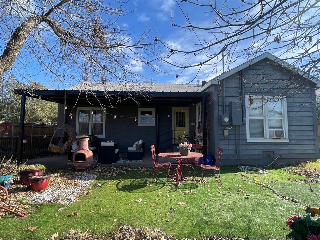 1208 Carolina Street Graham, TX 76450 - Photo 21 of 25 a backyard of a house with outdoor seating