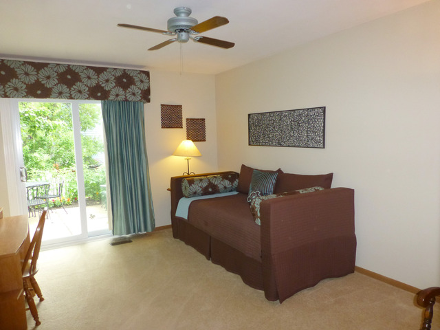 1726 Ranchview Drive Naperville, IL 60565 - Photo 11 of 14 a living room with furniture and a window