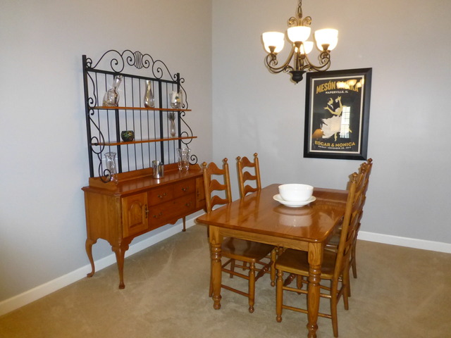 1726 Ranchview Drive Naperville, IL 60565 - Photo 6 of 14 a dining room with furniture and chandelier