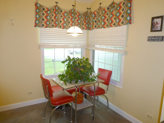 1726 Ranchview Drive Naperville, IL 60565 - Photo 8 of 14 a view of a dining room with furniture and wooden floor