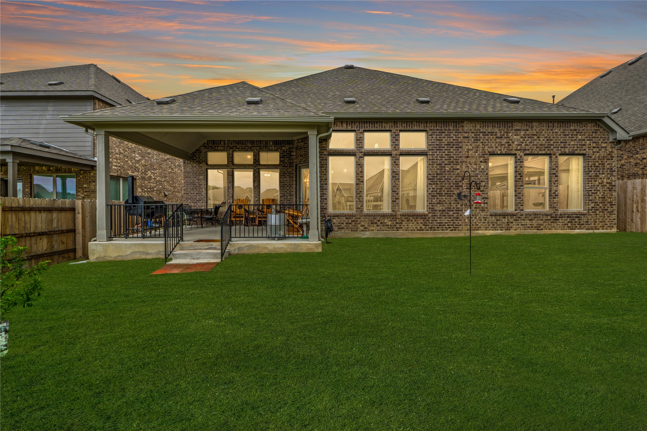 271 Tubman Drive Kyle, TX 78640 - Photo 29 of 40 a garden view with a seating space