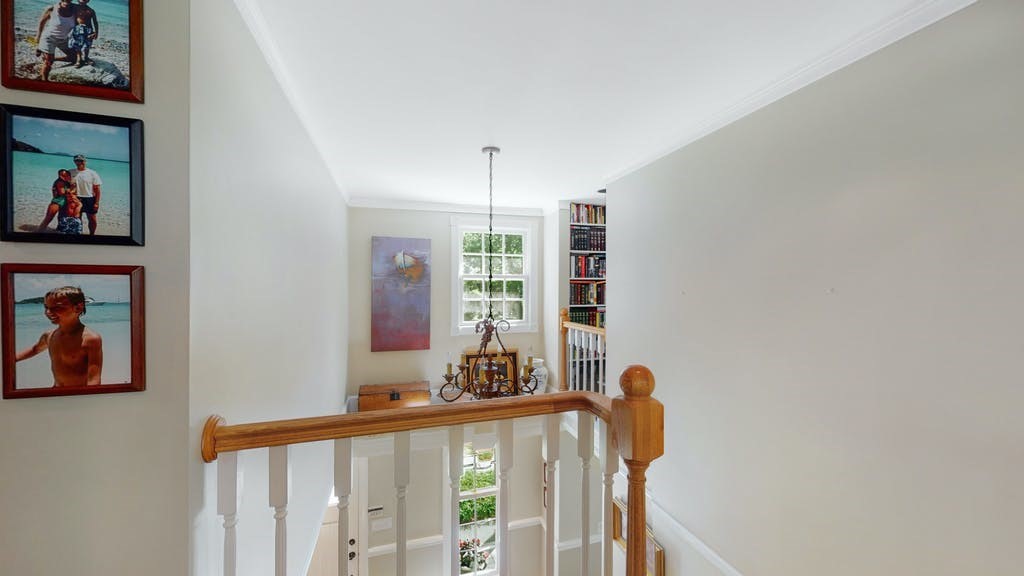 16 Chiltern Road Weston, MA 02493 - Photo 13 of 35 a view of a hallway with windows