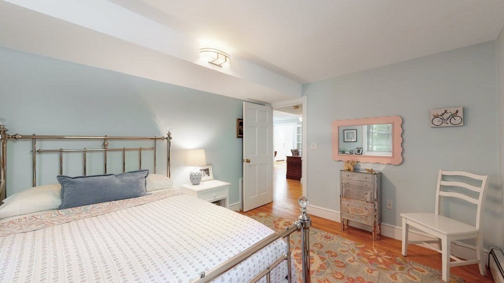 16 Chiltern Road Weston, MA 02493 - Photo 7 of 35 a bed room with a bed and a chair