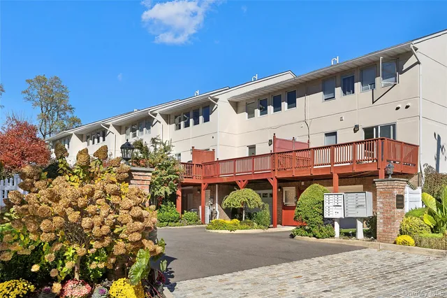 a front view of a building with glass windows