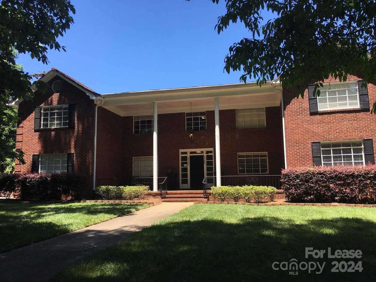 1708 Dilworth Road West, Unit 8 Charlotte, NC 28203 - Photo 2 of 15 front view of a house with a yard