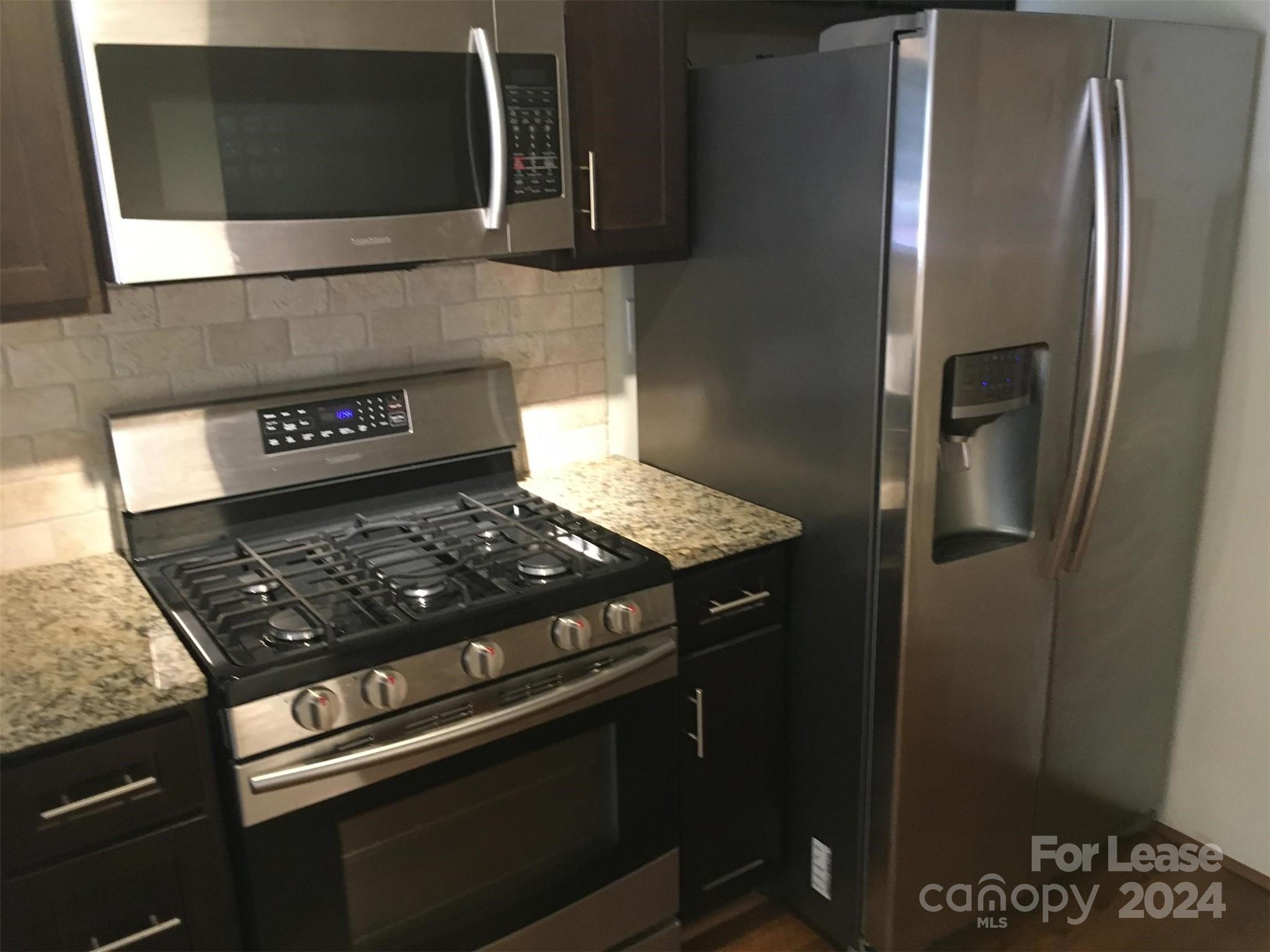 1708 Dilworth Road West, Unit 8 Charlotte, NC 28203 - Photo 7 of 15 a close view of stove