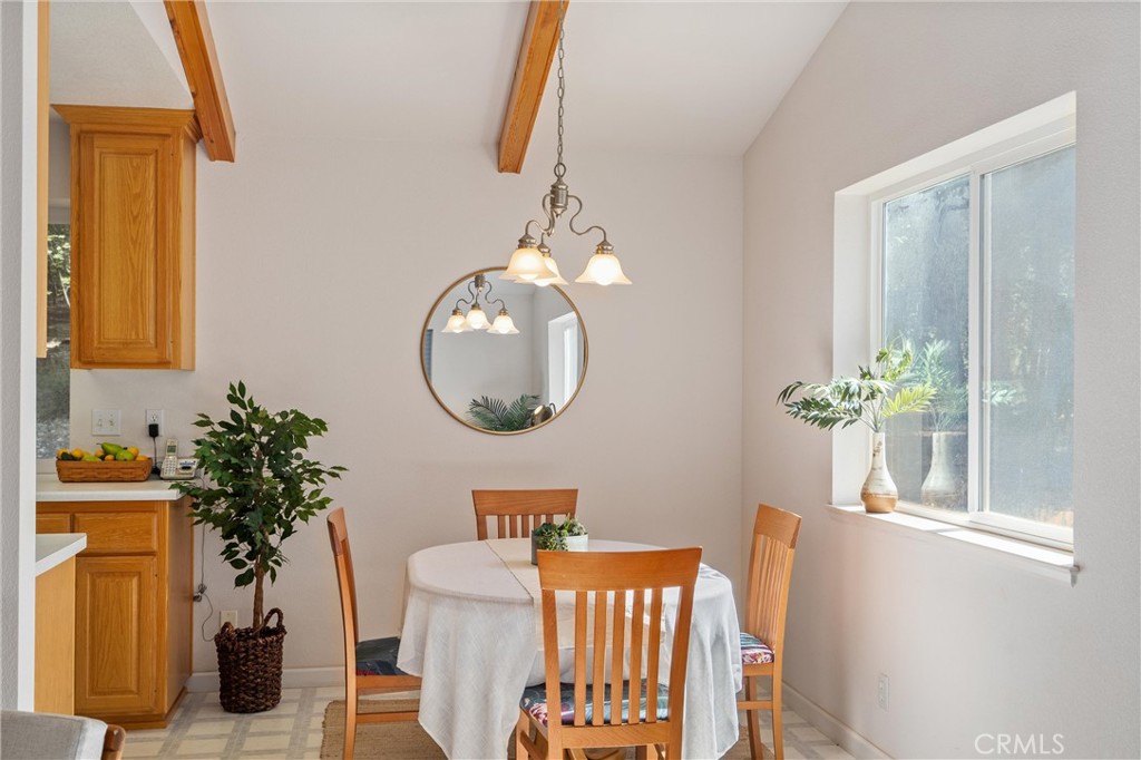 5245 Headwaters Road Forest Ranch, CA 95942 - Photo 15 of 47 a dining room with furniture and a mirror