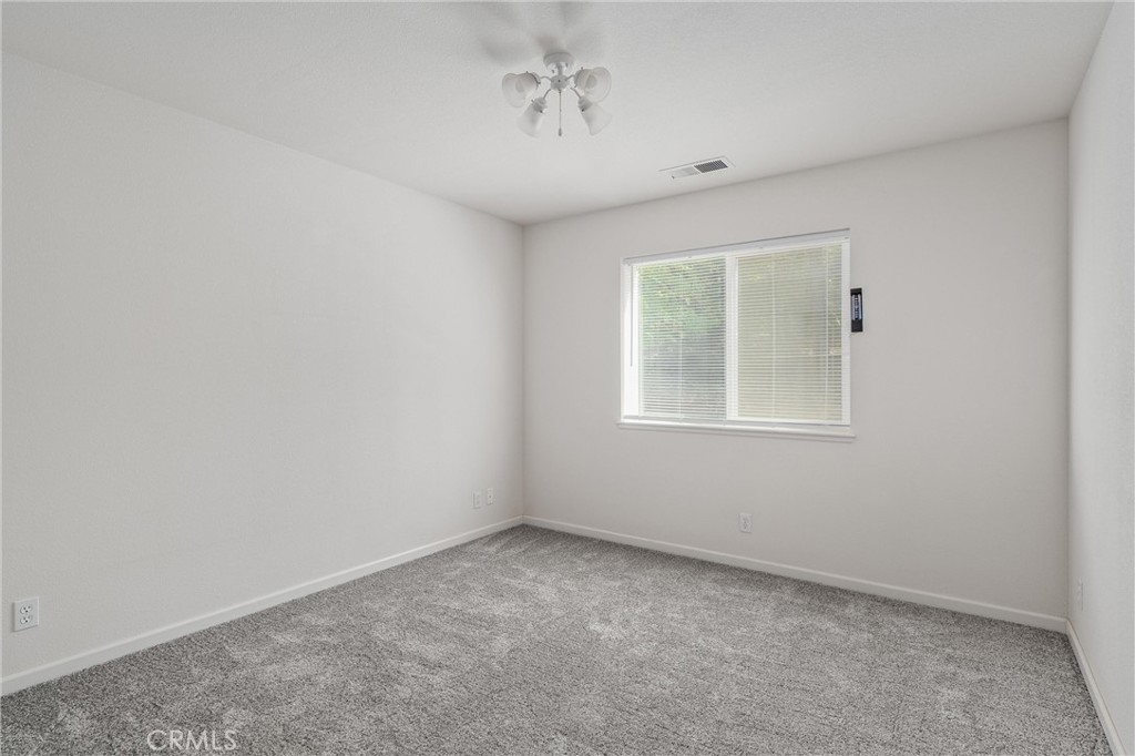 5245 Headwaters Road Forest Ranch, CA 95942 - Photo 22 of 47 a view of an empty room with a window