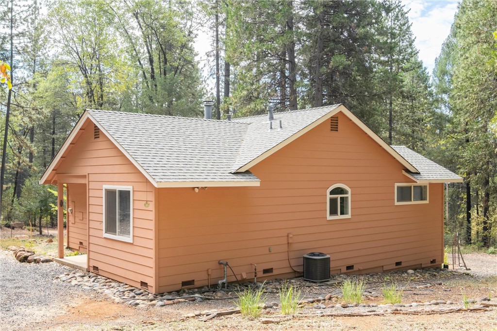 5245 Headwaters Road Forest Ranch, CA 95942 - Photo 26 of 47 a view of a house with a yard