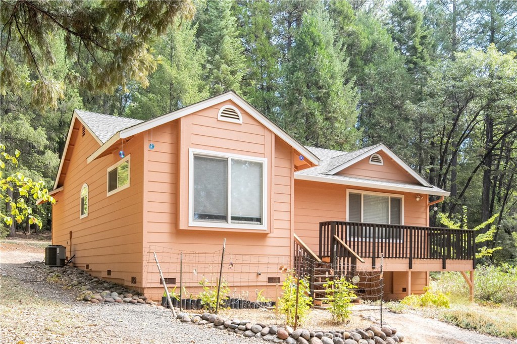 5245 Headwaters Road Forest Ranch, CA 95942 - Photo 28 of 47 a front view of a house with a yard
