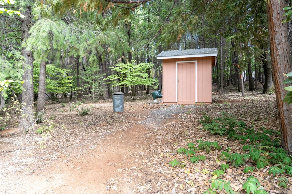 5245 Headwaters Road Forest Ranch, CA 95942 - Photo 42 of 47 a view of a house with a yard