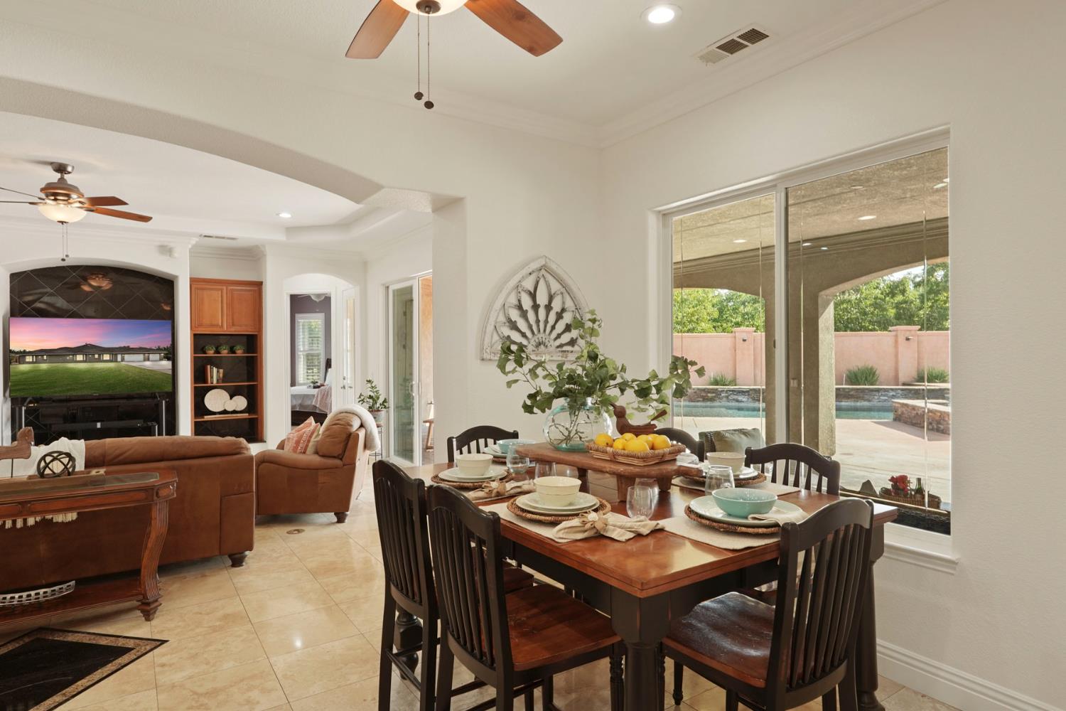 7306 Van Allen Road Stockton, CA 95215 - Photo 21 of 87 a view of a dining room with furniture window and outside view