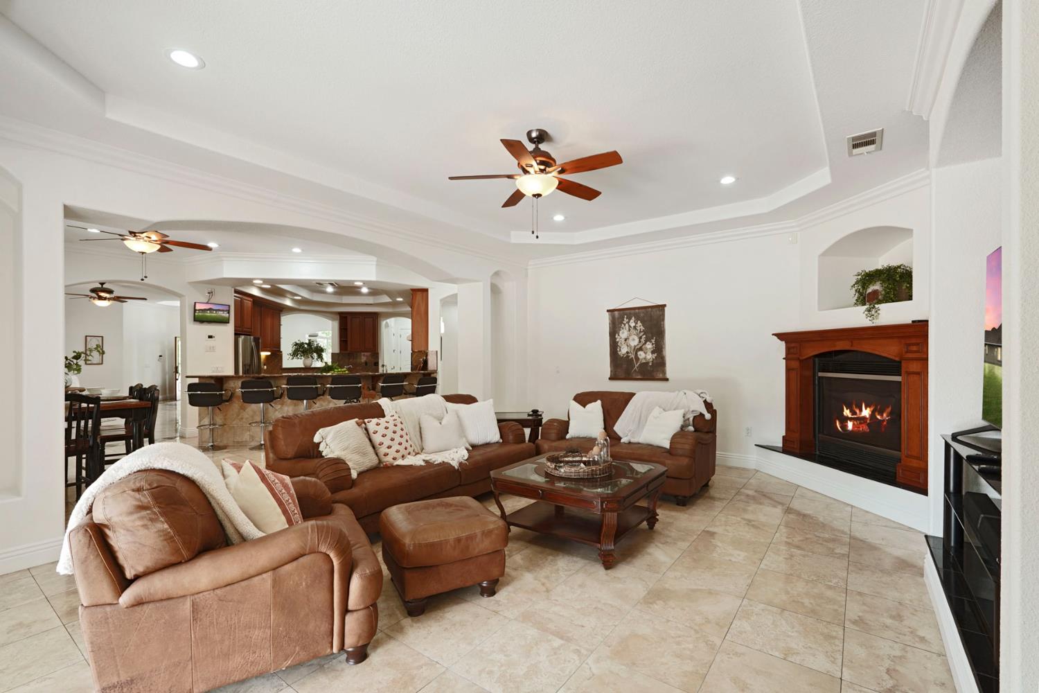 7306 Van Allen Road Stockton, CA 95215 - Photo 22 of 87 a living room with furniture and a fireplace